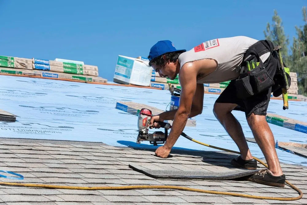 Slide of Tugwell Roofing