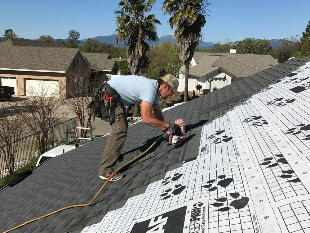 Slide of Tugwell Roofing