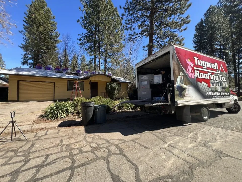 Slide of Tugwell Roofing