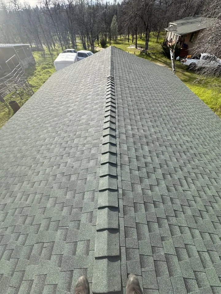 Slide of Tugwell Roofing