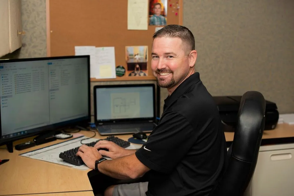 Slide of Tugwell Roofing