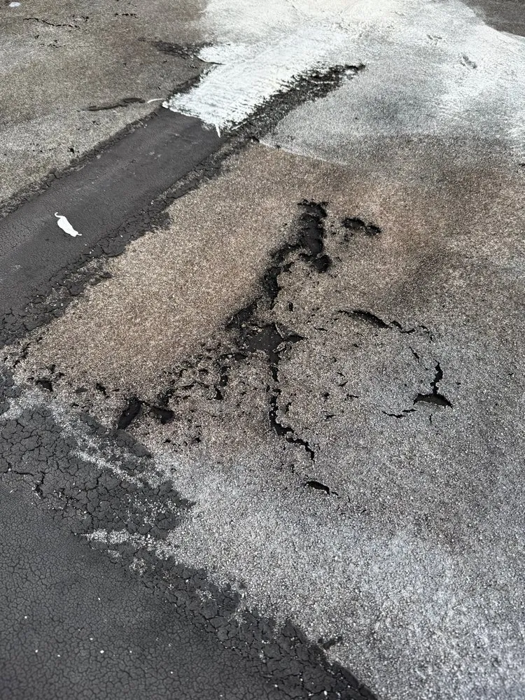 Slide of Tulba's Roofing