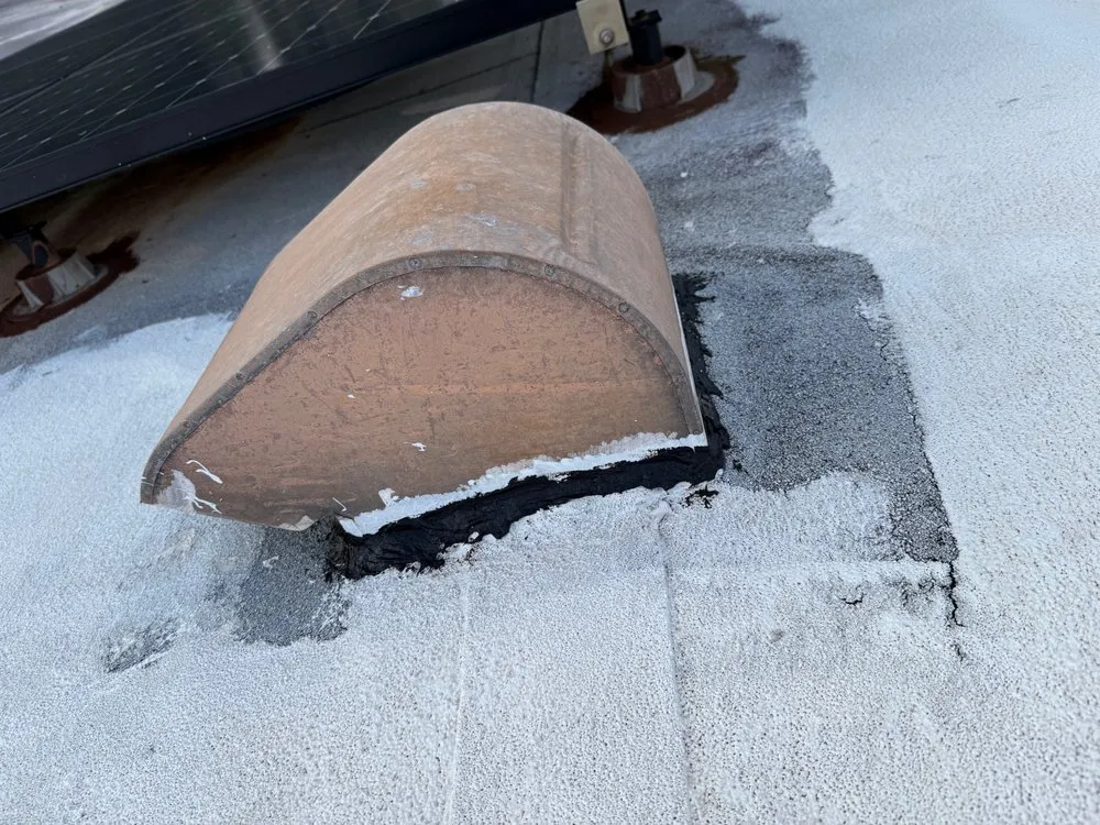 Slide of Tulba's Roofing