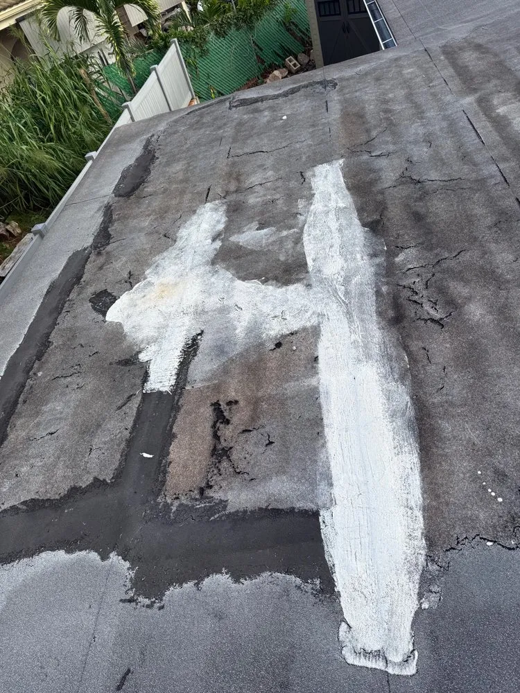 Slide of Tulba's Roofing