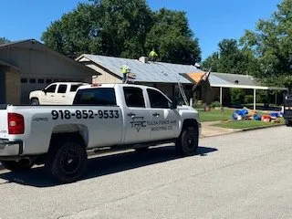 Slide of Tulsa Fence and Roofing Company