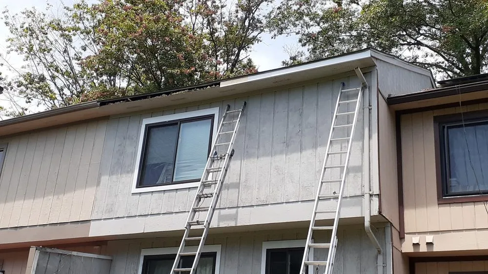 Slide of Tum's Gutter Services