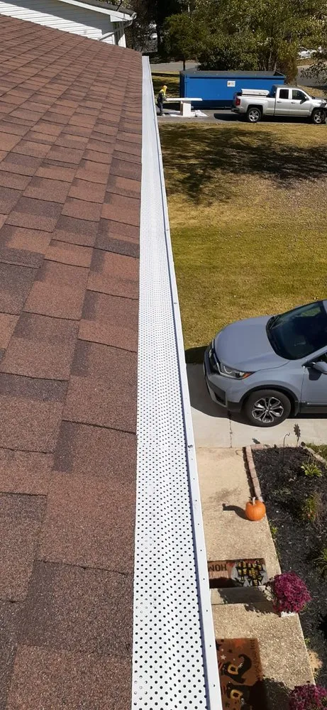 Slide of Tum's Gutter Services