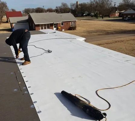 Turnkey Roofing And Construction Logo