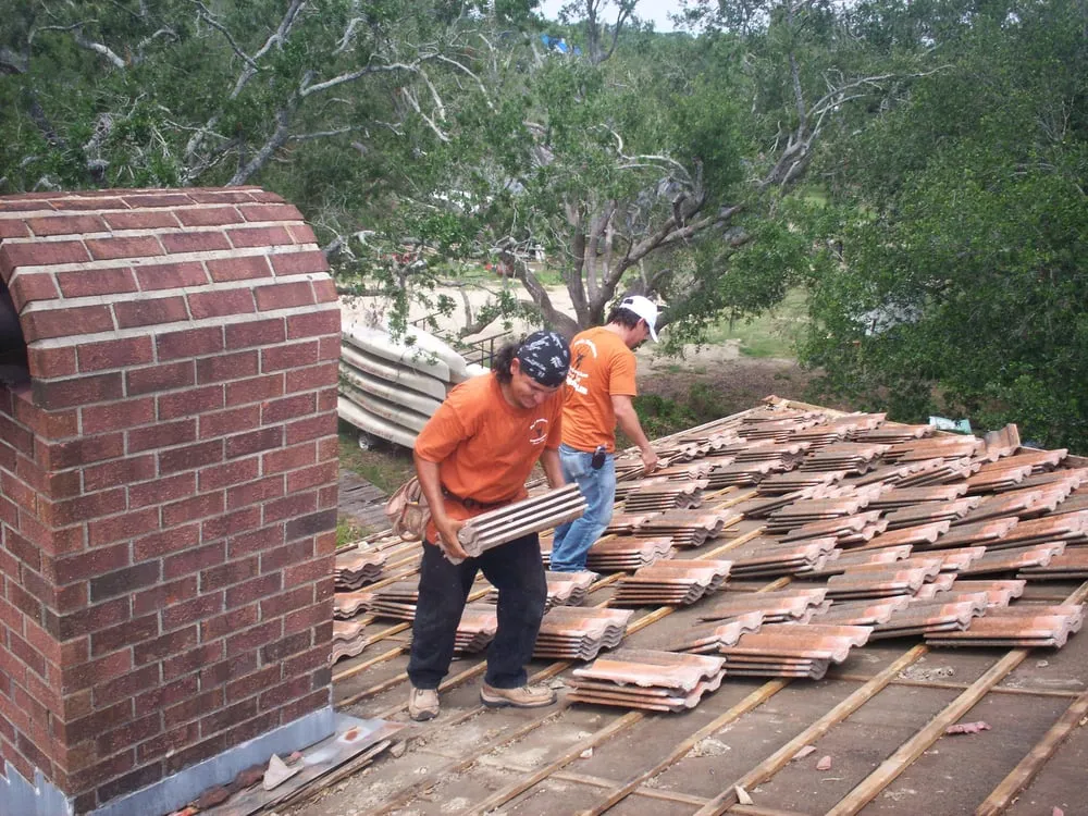 Slide of Twin Brothers Roofing