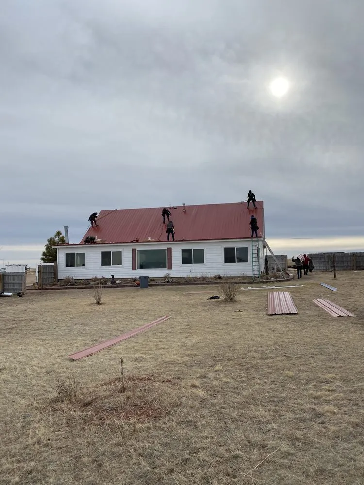 Slide of Twin Mountain Roofing