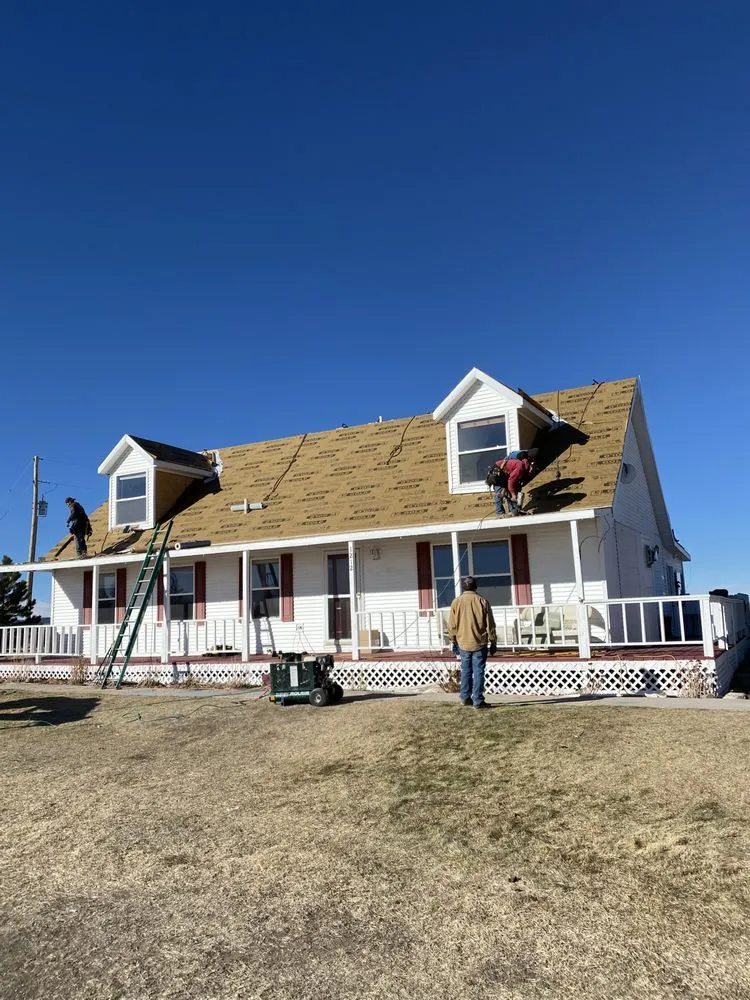 Slide of Twin Mountain Roofing