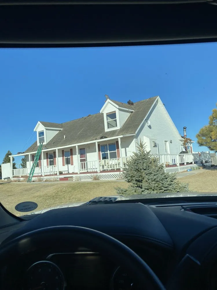 Slide of Twin Mountain Roofing