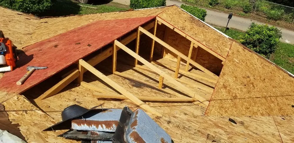 Slide of Twin Roofing