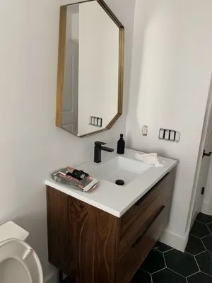 Twins Building Construction &Roofing Logo