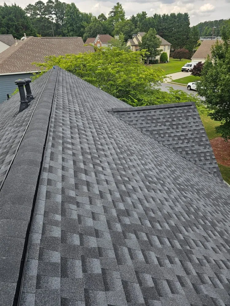 Slide of Twins Roofing & Construction