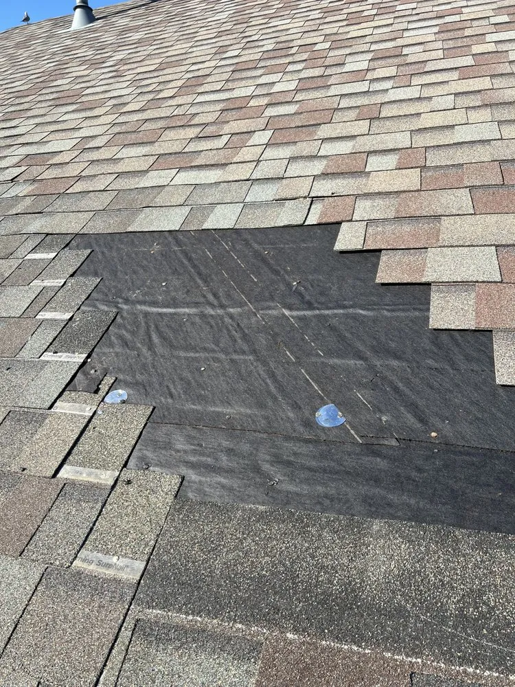 Slide of Twins Roofing