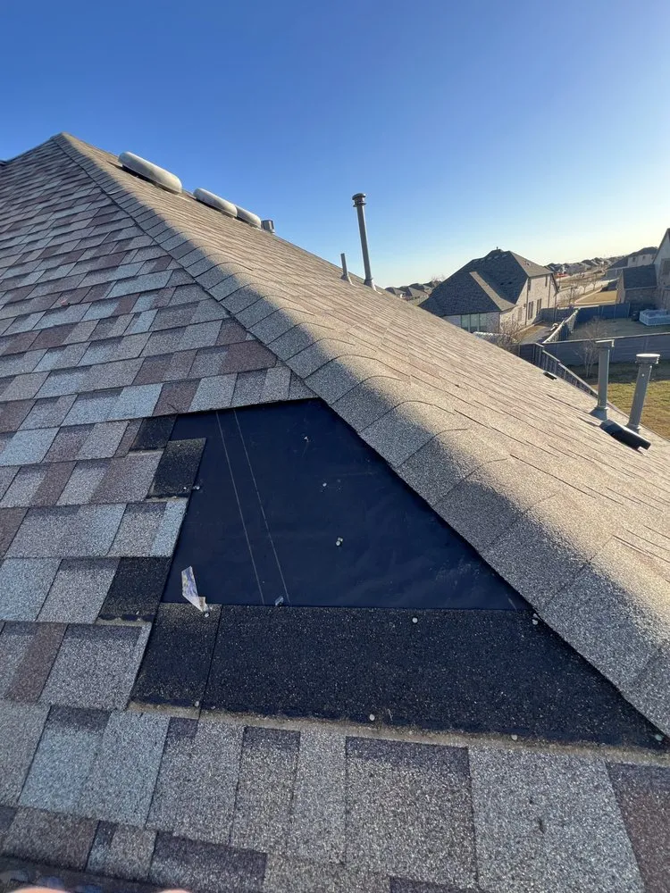 Slide of Twins Roofing