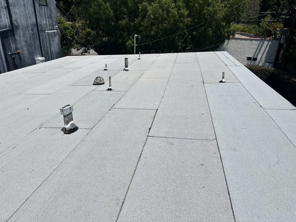 Slide of Twins Roofing