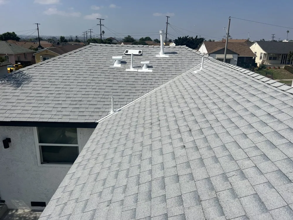 Slide of Twins Roofing