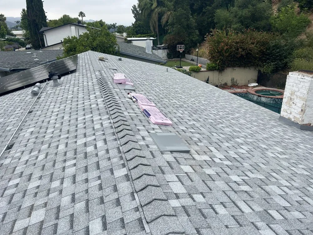 Slide of Twins Roofing