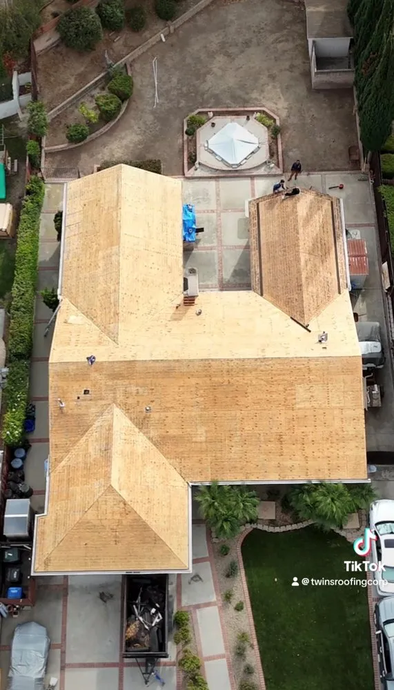 Slide of Twins Roofing