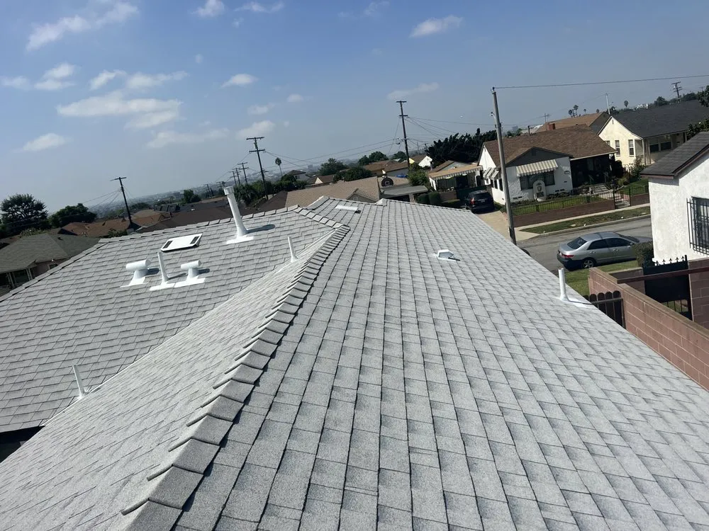 Slide of Twins Roofing