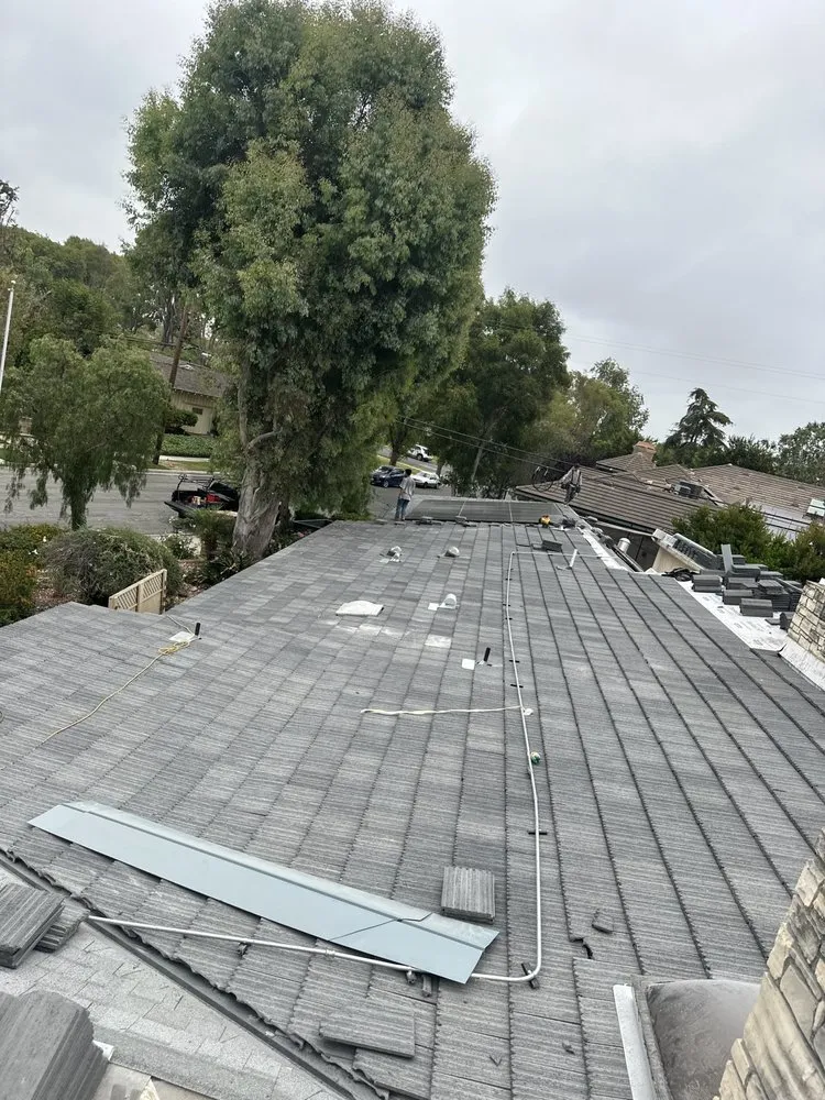 Slide of Twins Roofing