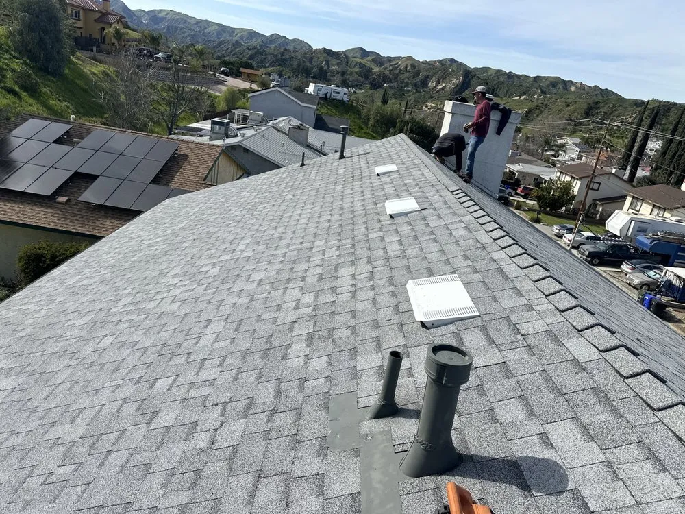 Slide of Twins Roofing