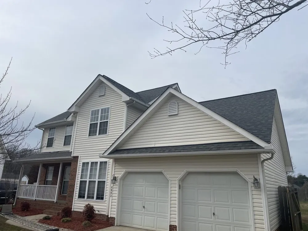 Slide of Twins Roofing Solutions