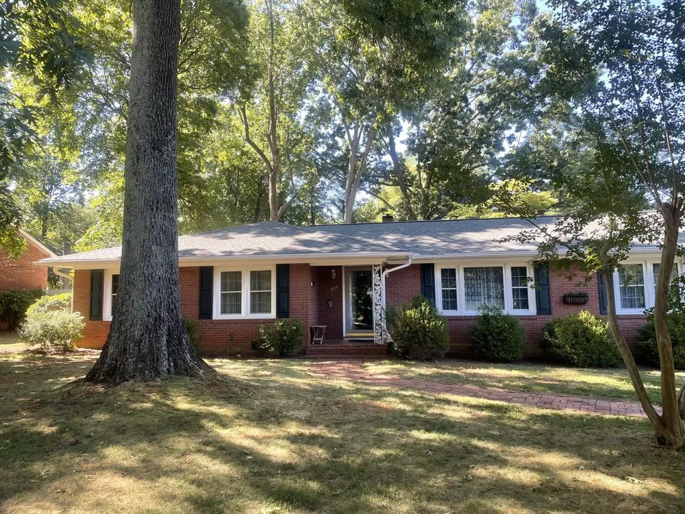 Slide of Twins Roofing Solutions