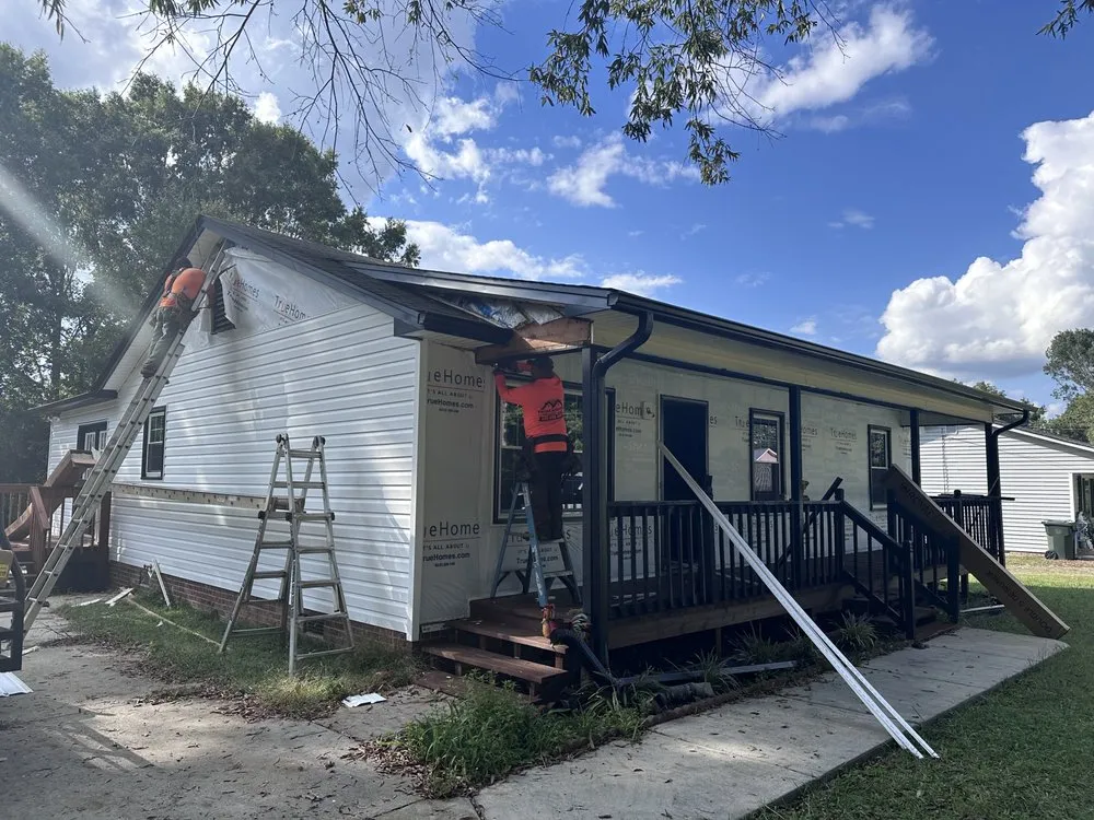 Slide of Twins Roofing Solutions