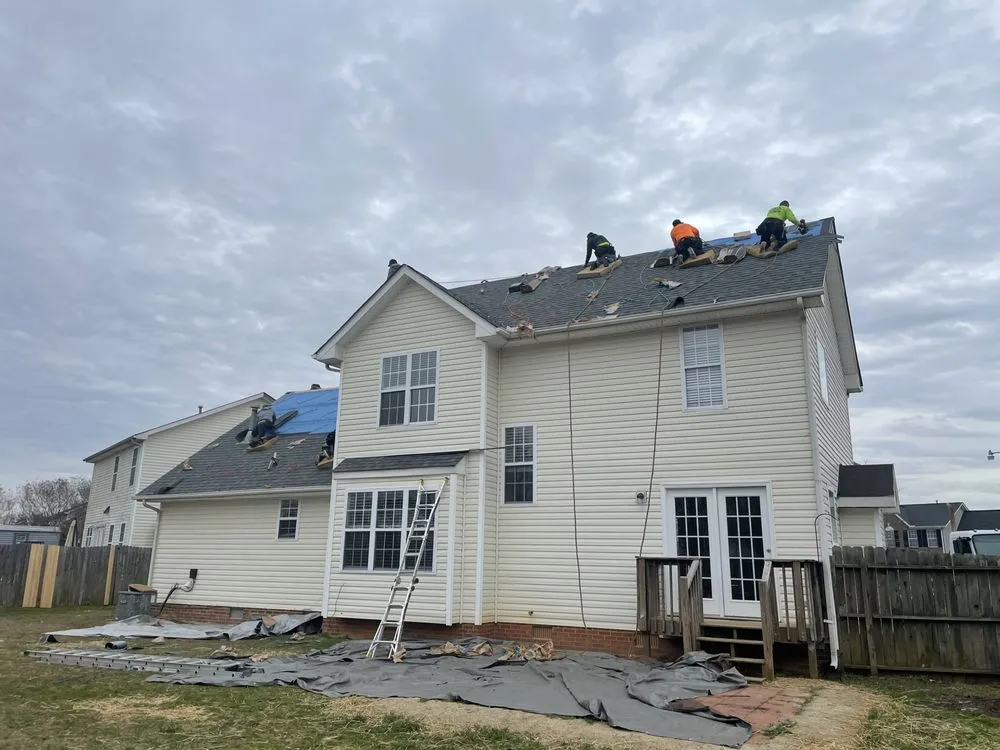 Slide of Twins Roofing Solutions