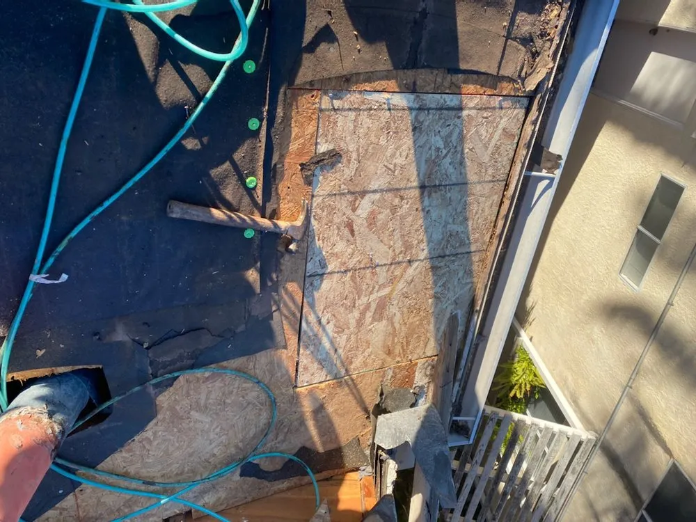 Slide of TWM Roofing