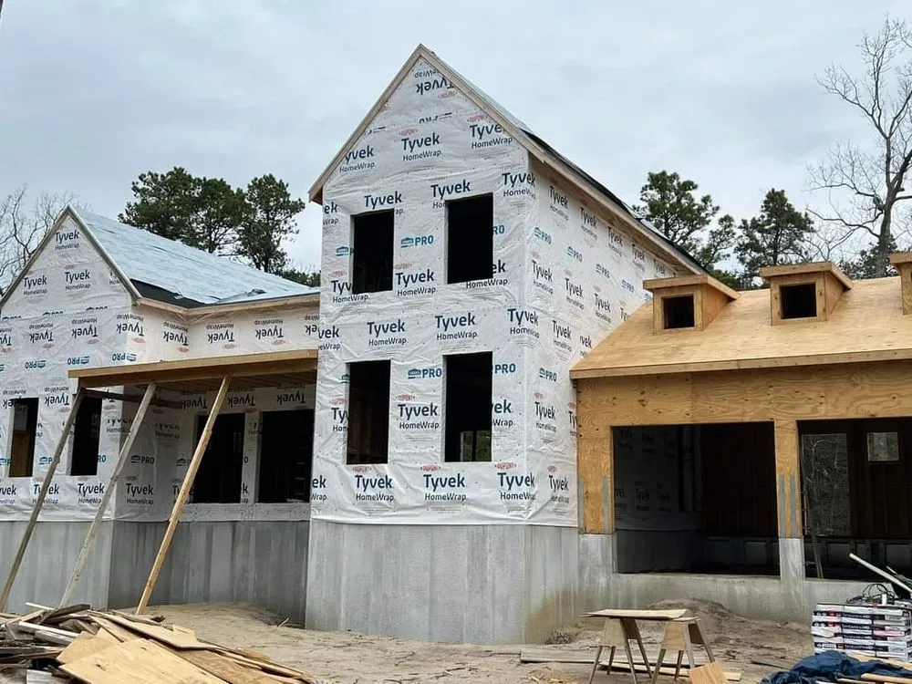 Slide of TWO and a half MEN Construction