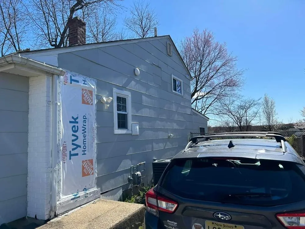 Slide of TWO and a half MEN Construction