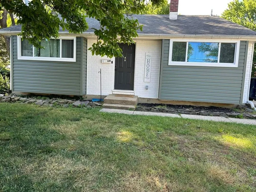 Slide of TWO and a half MEN Construction