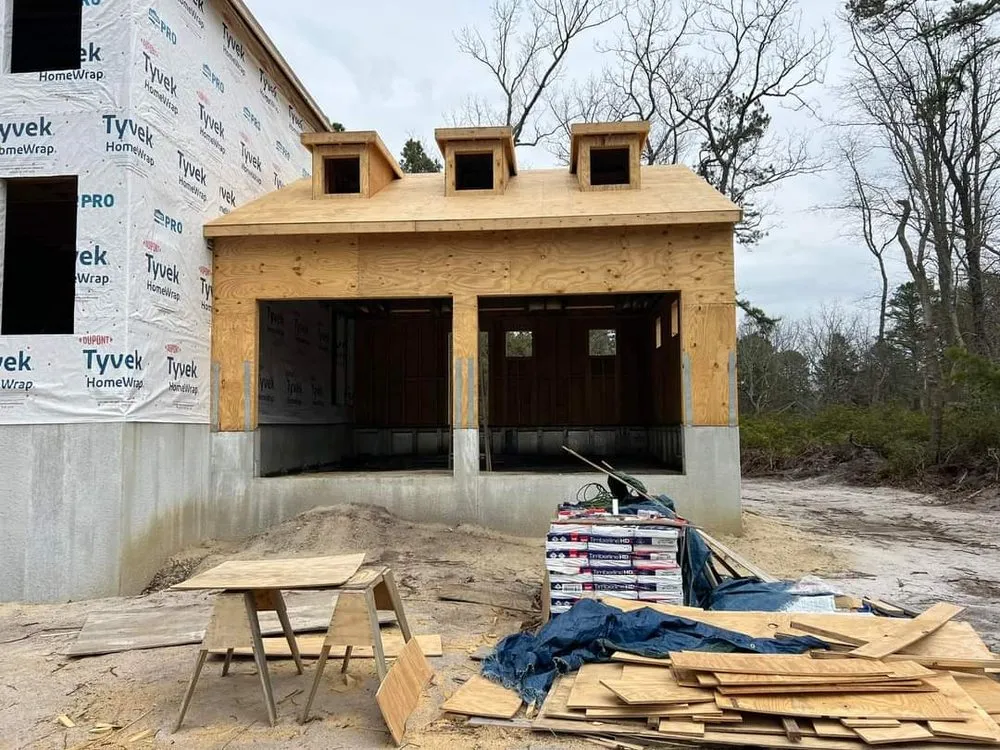 Slide of TWO and a half MEN Construction