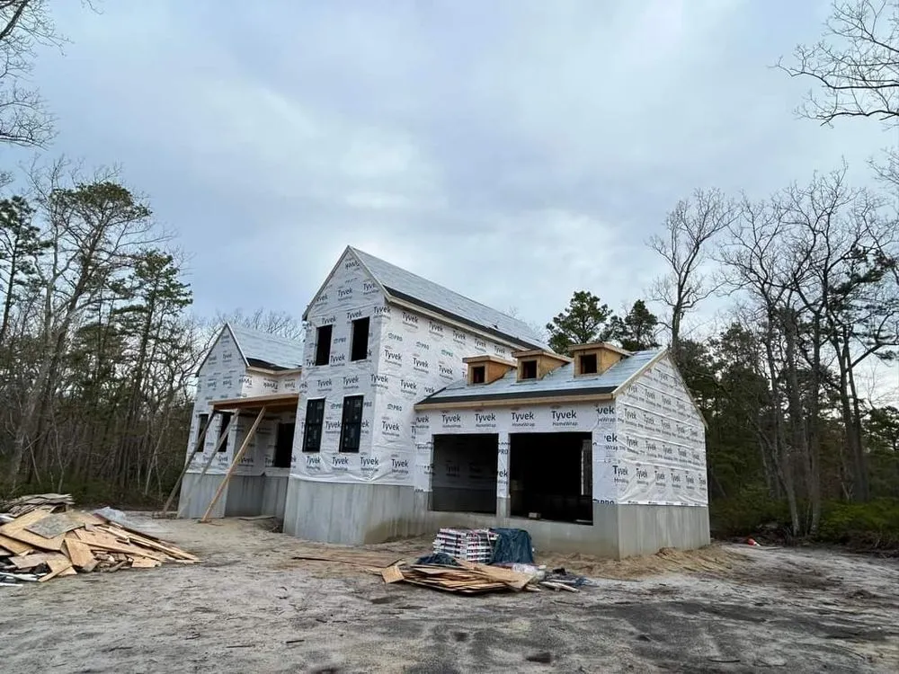 Slide of TWO and a half MEN Construction