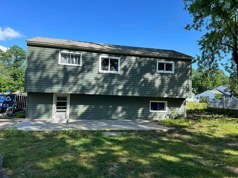 Slide of TWO and a half MEN Construction