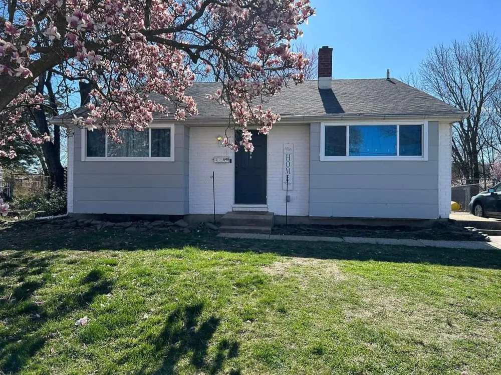 Slide of TWO and a half MEN Construction