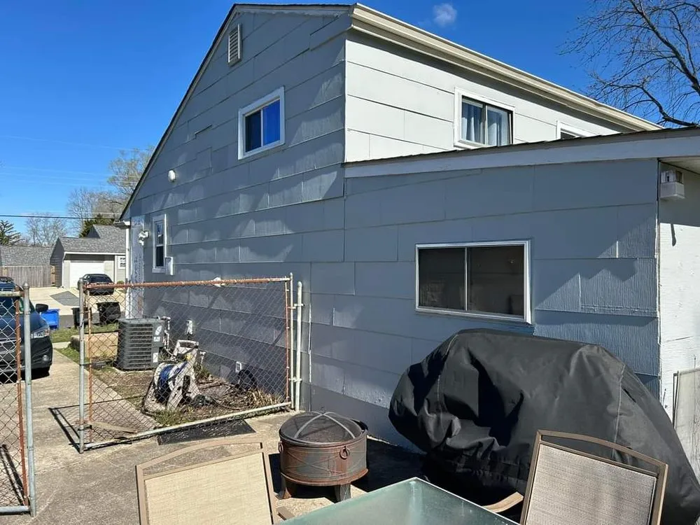 Slide of TWO and a half MEN Construction