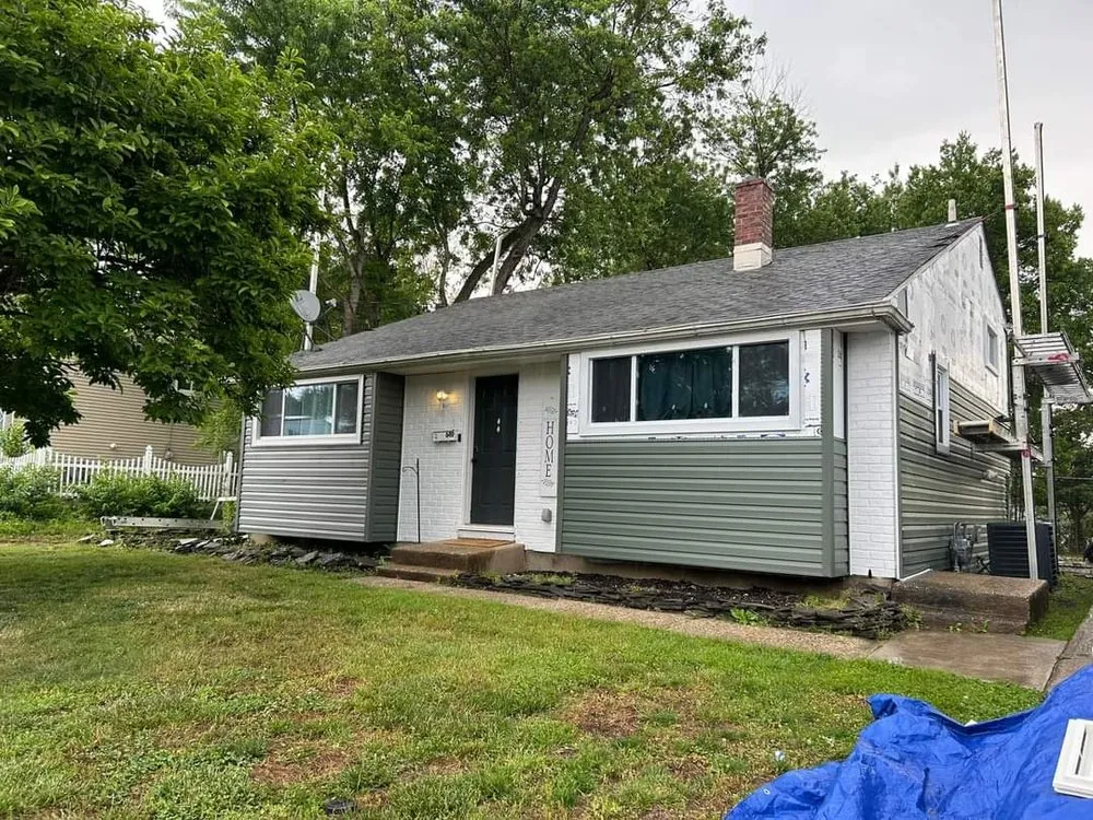 Slide of TWO and a half MEN Construction