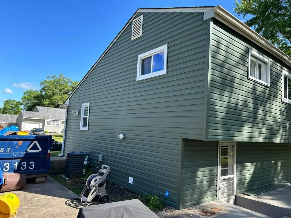 Slide of TWO and a half MEN Construction