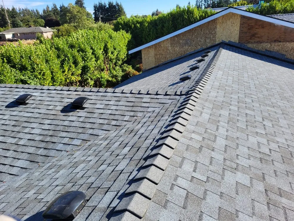 Slide of Two Angels Roofing