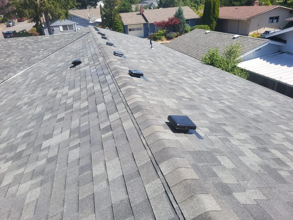 Slide of Two Angels Roofing