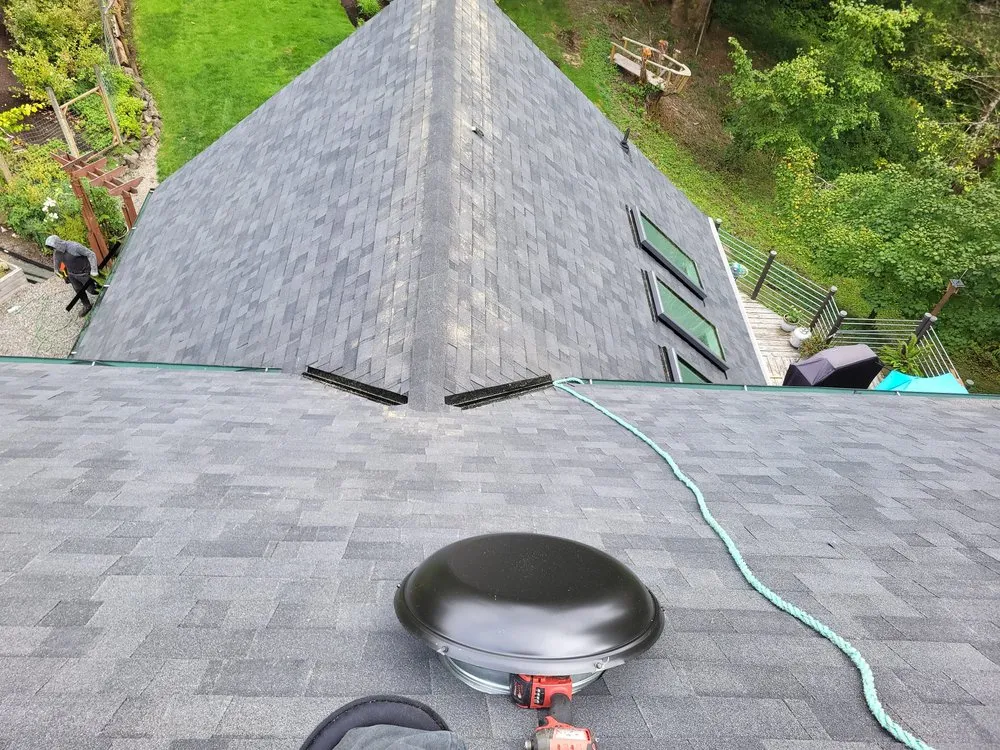 Slide of Two Angels Roofing