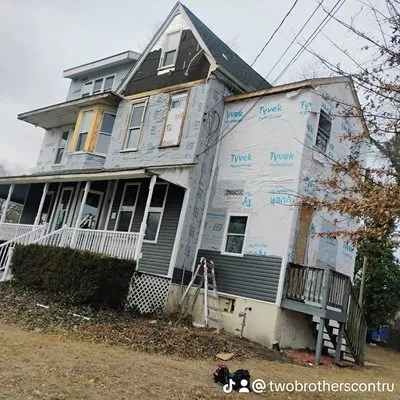 Two Brothers G Construction Logo