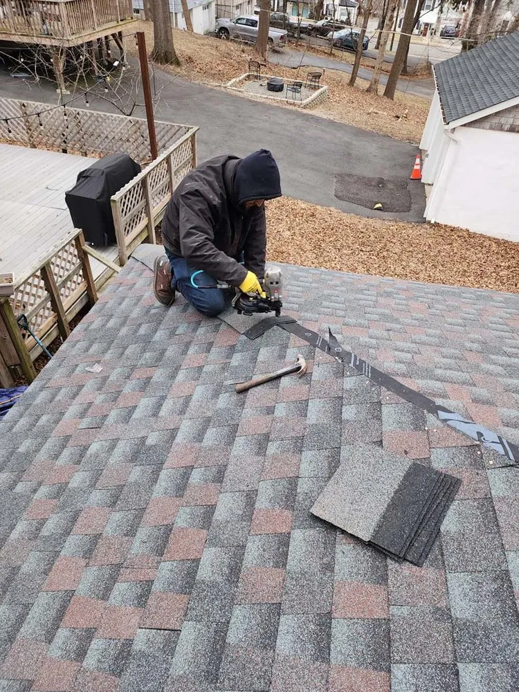 Slide of Two Brothers Roof & Chimney