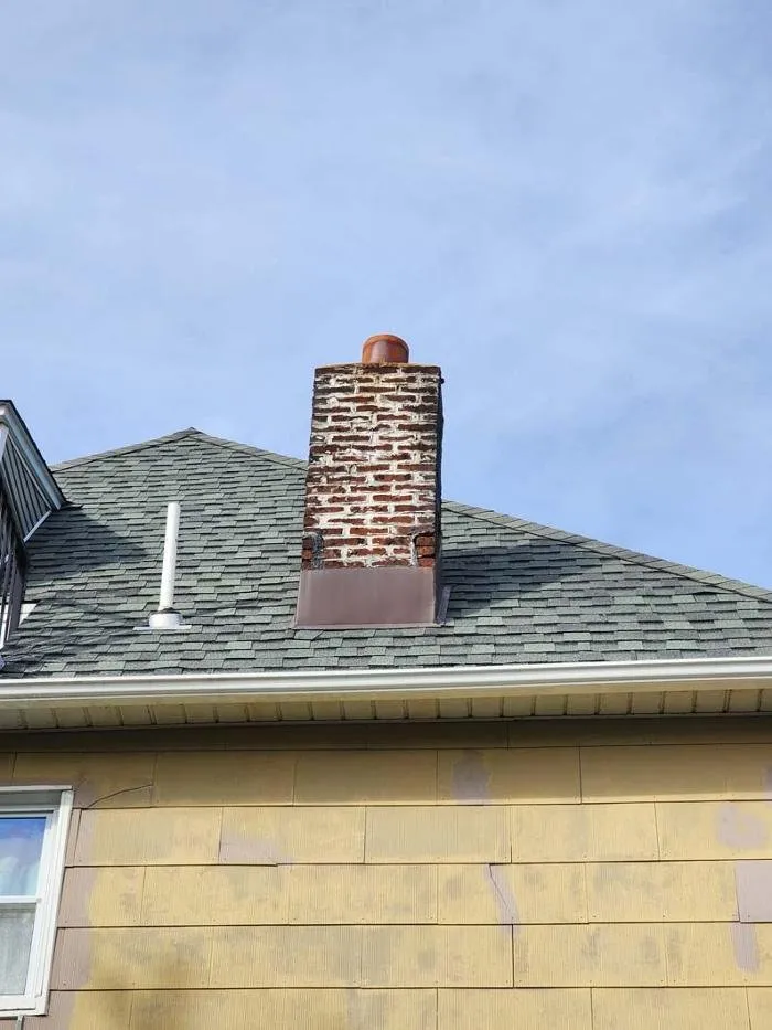Slide of Two Brothers Roof & Chimney