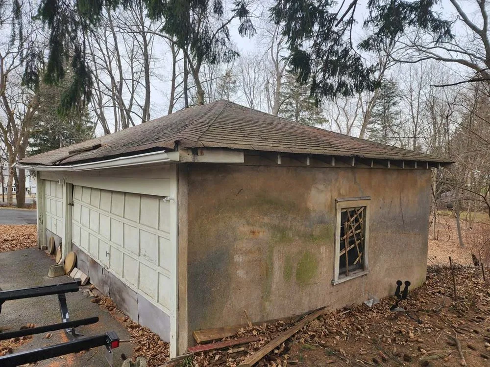 Slide of Two Brothers Roof & Chimney